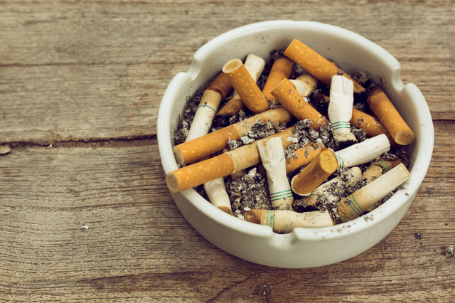 cigarette stub in ashtray, image no smoking concept background